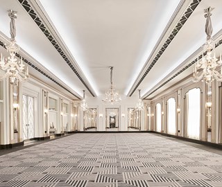 A view of the empty Ballroom at Claridge's Hotel, with its art deco interior design and luxurious crystal chandeliers.